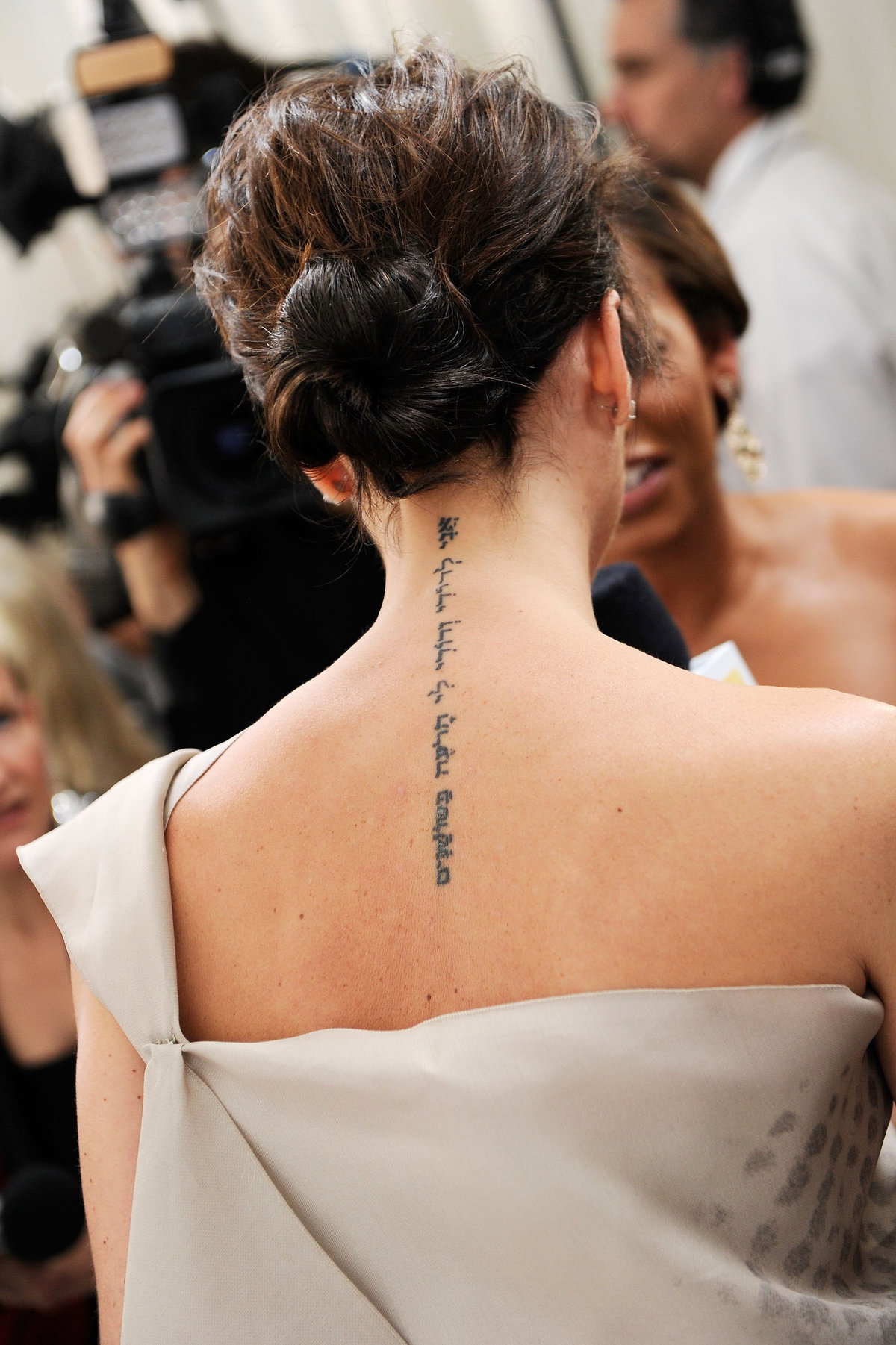 Senkrechte Rücken-Tattoos