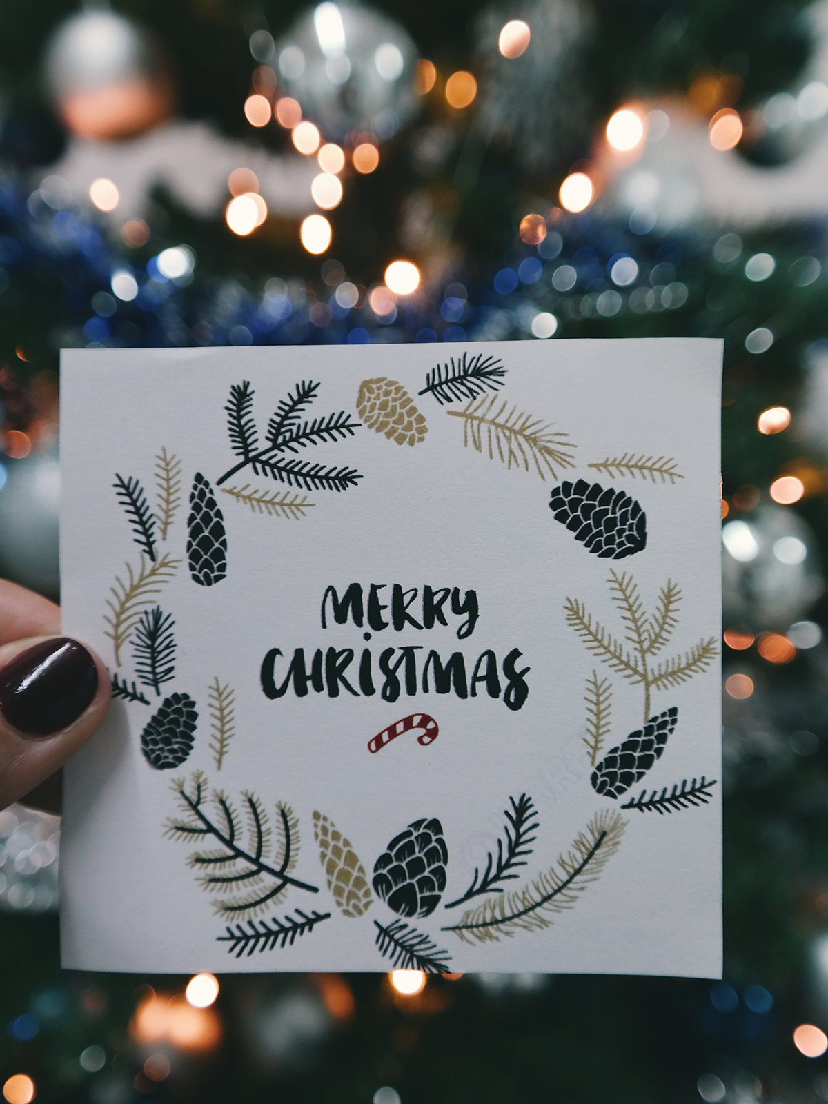 Weihnachtskarte mit "Merry Christmas"-Aufschrift