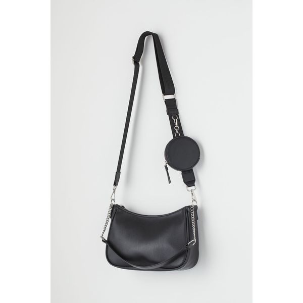 Schwarze Tasche mit Geldbörse