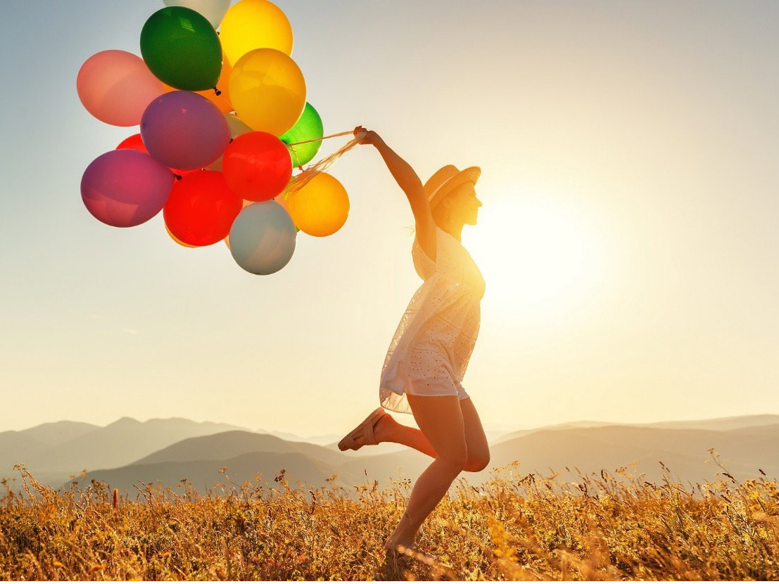 Frau mit Ballons
