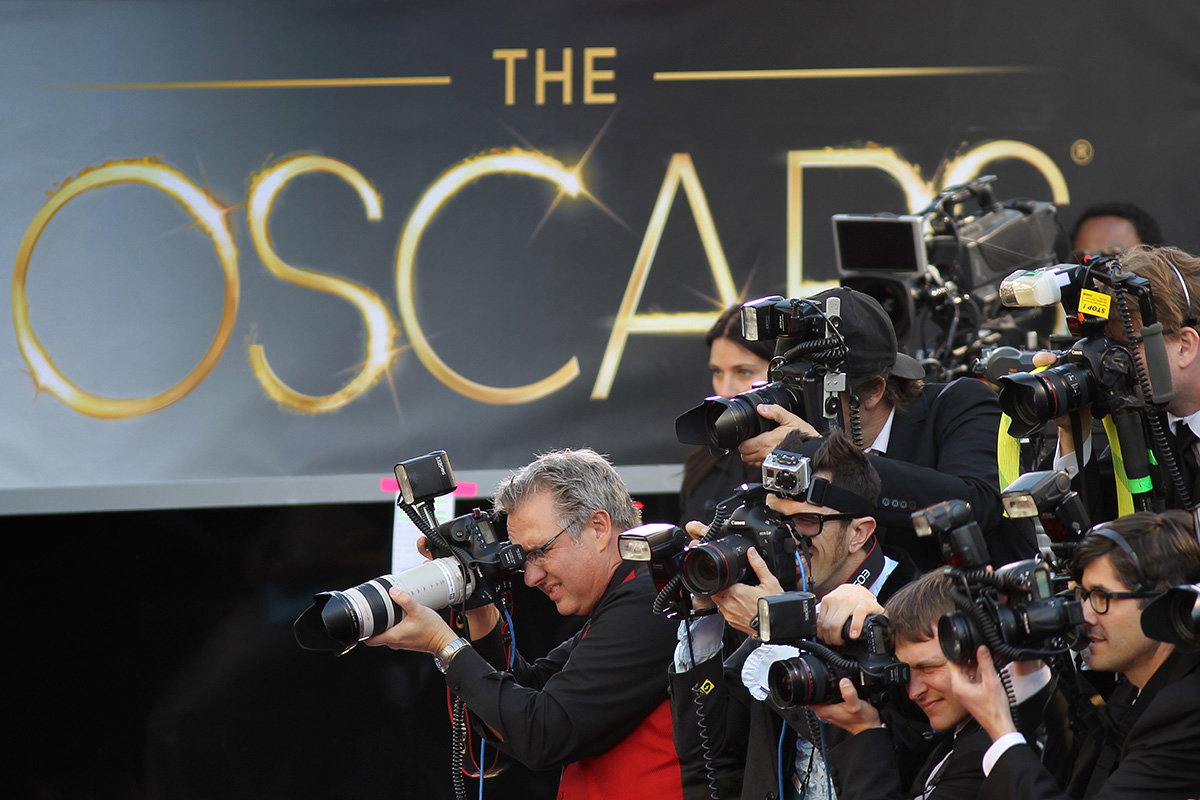 Fotografen vor Oscars Wand