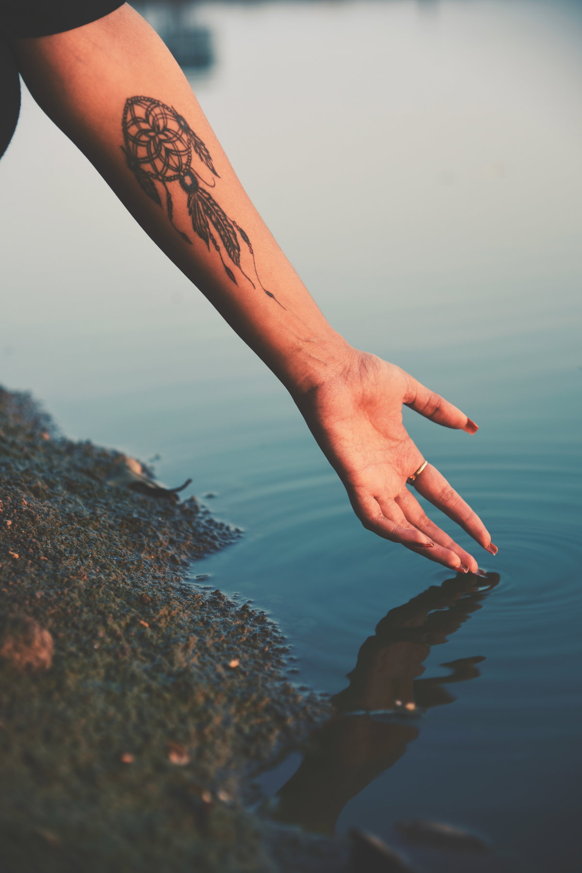 Traumfänger-Tattoo auf Unterarm