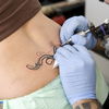 Arschgeweih: Schöne Motivideen und Infos über das kultige Trendtattoo