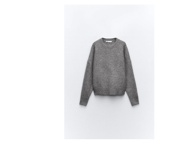 Grauer Pullover