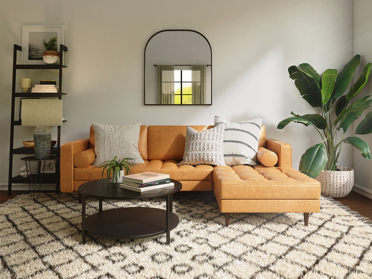 Wohnzimmer mit orangefarbener Couch
