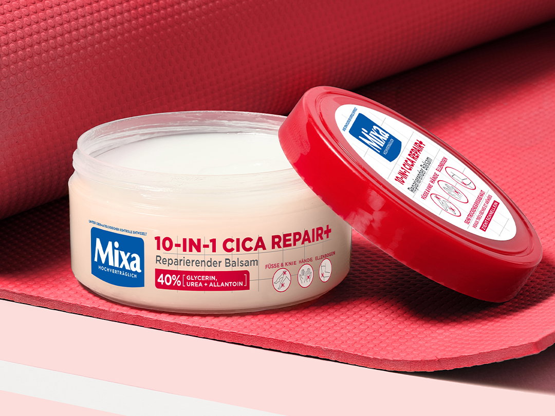 Der 10-in-1 Cica Repair+ Reparierende Balsam von Mixa enthält unter anderem Urea