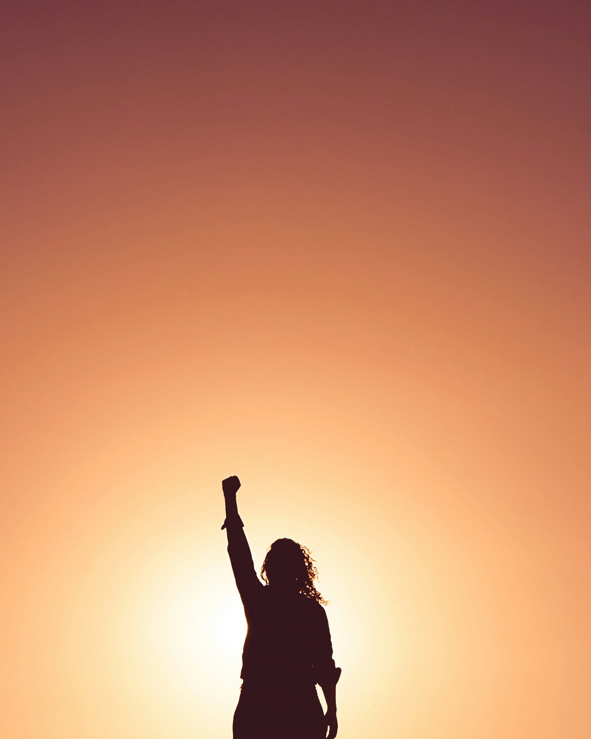 Horoskop: Frau in Siegerpose