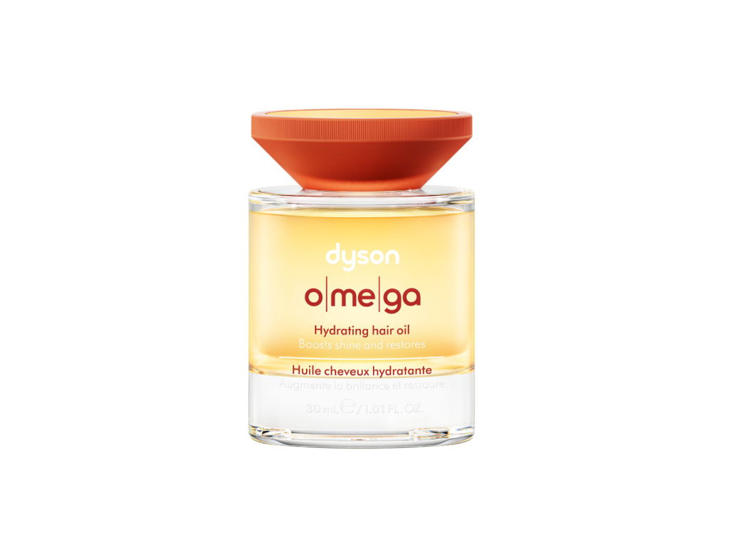 Dyson Omega Haaröl in einer kleinen Glasflasche mit orangenem Deckel.