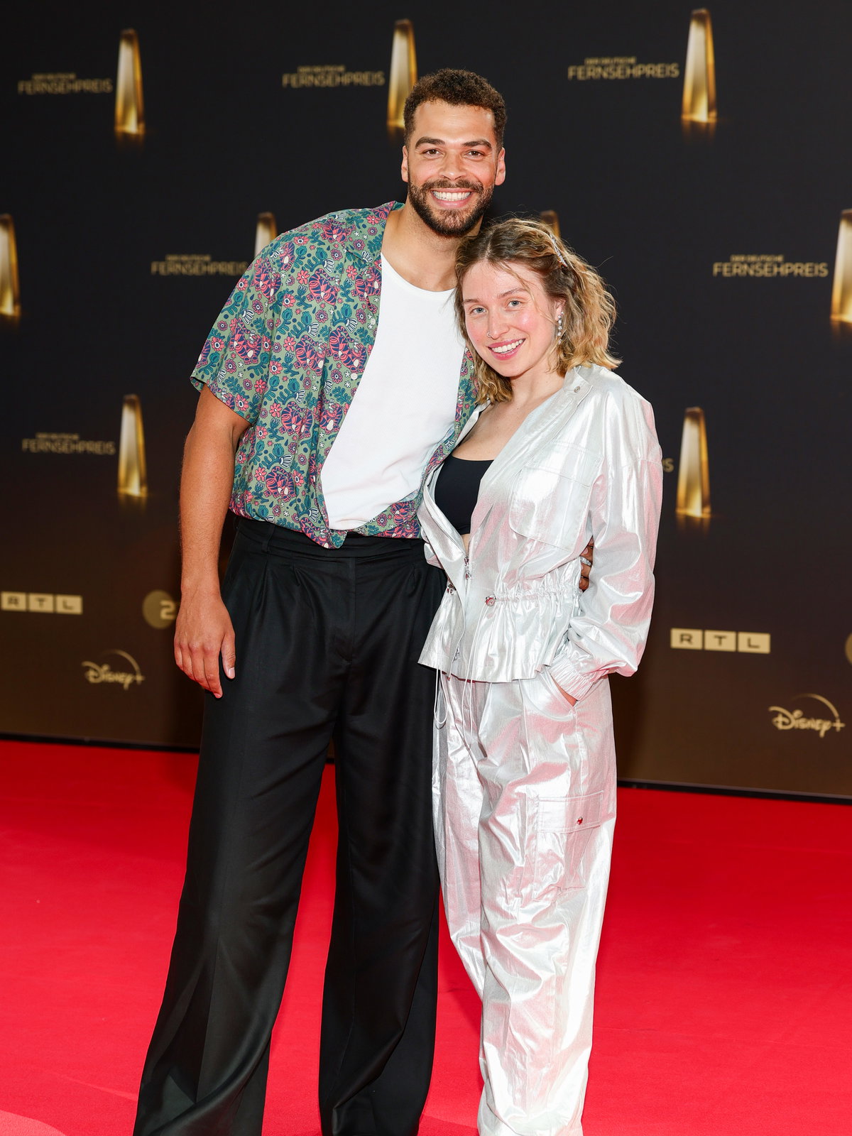 Bianca Heinicke und Timothy Hill auf dem Roten Teppich.