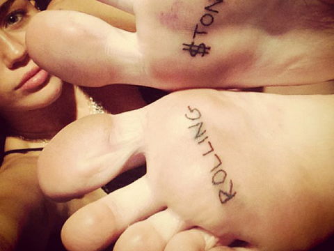 miley-rolling-stone-tattoo-1861076.jpg